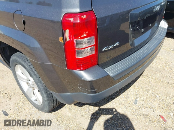 2014 Jeep Patriot Latitude with VIN 1C4NJRFB3ED886007, listed as a IAAI auction lot 41285963 with 127,007 mi miles and . Bid and sale history available at DreamBid. Image 18.