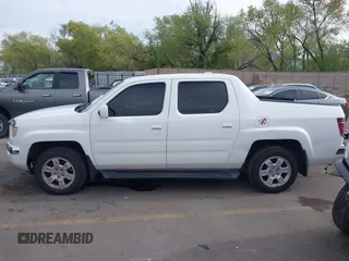 2006 Honda Ridgeline RTL z VIN 2HJYK16586H519593, wystawiony jako IAAI lot #42111678 z przebiegiem 244 962 mil mil oraz . Historia ofert i sprzedaży dostępna na DreamBid. Obrazek 14.