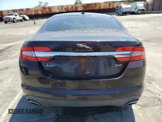 2015 Jaguar XF V6 Portfolio with VIN SAJWA0F79F8U60216, listed as a Copart auction lot 54969245 with 88,954 mi miles and Salvage Title. Bid and sale history available at carsss.com. Image 6.
