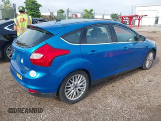 2014 Ford Focus Titanium with VIN 1FADP3N28EL119791, listed as a IAAI auction lot 42712044 with 144,338 mi miles and . Bid and sale history available at DreamBid. Image 4.