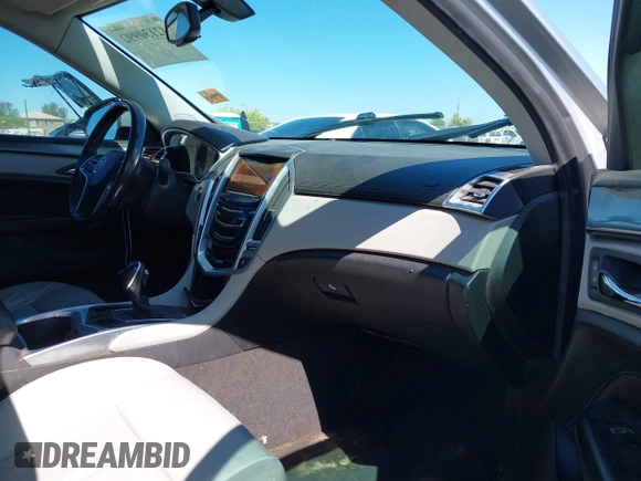 2014 Cadillac SRX with VIN 3GYFNAE31ES576016, listed as a IAAI auction lot 42130992 with 160,114 mi miles and . Bid and sale history available at DreamBid. Image 5.