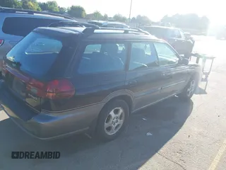 1998 Subaru Legacy Outback with VIN 4S3BG6856W7608371, listed as a IAAI auction lot 42522025 with 216,491 mi miles and . Bid and sale history available at DreamBid. Image 4.