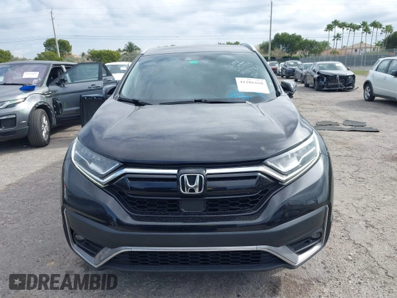 2021 Honda CR-V Touring with VIN 2HKRW1H91MH410751, listed as a IAAI auction lot 41286168 with 56,314 mi miles. Bid and sale history available at carsss.com. Image 6.