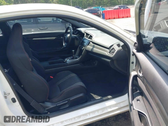 2018 Honda Civic Si z VIN 2HGFC3A54JH755941, wystawiony jako IAAI lot #42269677 z przebiegiem 99 627 mil mil oraz . Historia ofert i sprzedaży dostępna na DreamBid. Obrazek 5.