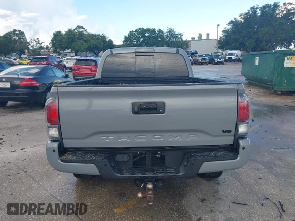 2020 Toyota Tacoma SR5 with VIN 3TMDZ5BN3LM080702, listed as a IAAI auction lot 42463811 with 70,185 mi miles and . Bid and sale history available at DreamBid. Image 16.