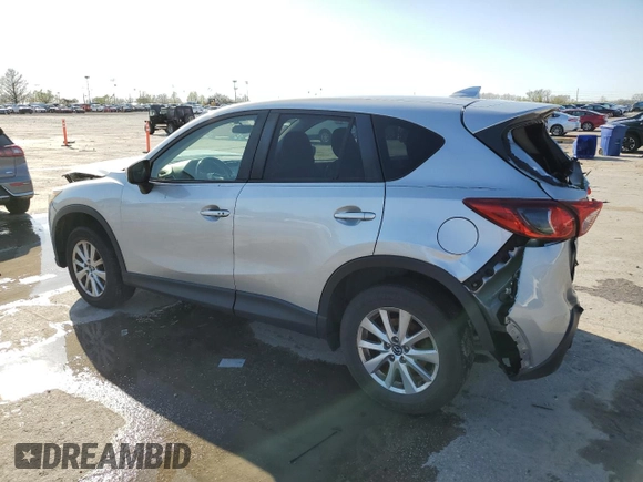2016 Mazda CX-5 Touring with VIN JM3KE2CY8G0614335, listed as a Copart auction lot 52124465 with 218,320 mi miles and Salvage Title. Bid and sale history available at carsss.com. Image 2.