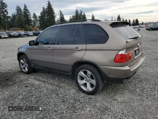 2006 BMW X5 4.4i with VIN 5UXFB53516LV27950, listed as a Copart auction lot 77837014 with 210,855 mi miles and Salvage Title. Bid and sale history available at carsss.com. Image 2.