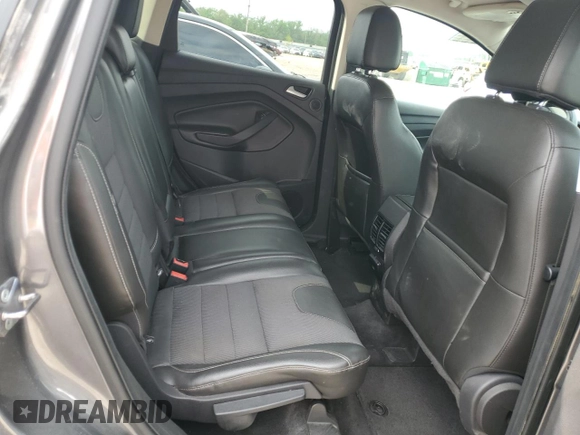 2013 Ford Escape Titanium z VIN 1FMCU0J98DUB64363, wystawiony jako Copart lot #54772925 z przebiegiem 109 956 mil mil oraz Szkody całkowita. Historia ofert i sprzedaży dostępna na DreamBid. Obrazek 11.