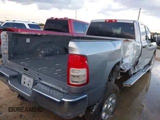2023 Ram 2500 Lone Star with VIN 3C6UR5JJ7PG562101, listed as a IAAI auction lot 42731927 with 79,356 mi miles and . Bid and sale history available at DreamBid. Image 4.