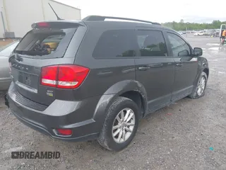2017 Dodge Journey SXT with VIN 3C4PDCBG7HT588556, listed as a IAAI auction lot 42167063 with 149,397 mi miles and . Bid and sale history available at DreamBid. Image 4.