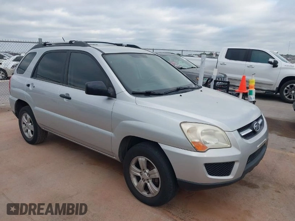2009 Kia Sportage LX with VIN KNDJF724097567390, listed as a IAAI auction lot 42066762 with 159,946 mi miles. Bid and sale history available at carsss.com. Image 1.