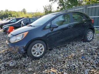 2014 Kia Rio LX with VIN KNADM5A35E6406188, listed as a Copart auction lot 60155034 with 119,789 mi miles and Salvage Title. Bid and sale history available at carsss.com. Image 1.