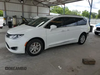 2020 Chrysler Pacifica Touring L with VIN 2C4RC1BG1LR123606, listed as a Copart auction lot 61041315 with 115,623 mi miles and Salvage title. Bid and sale history available at DreamBid. Image 1.