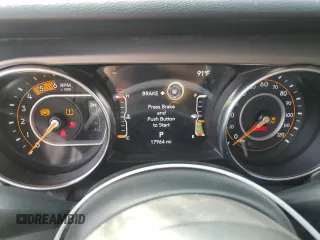 2022 Jeep Gladiator Willys with VIN 1C6JJTAMXNL135925, listed as a Copart auction lot 71642054 with 17,964 mi miles and Salvage title. Bid and sale history available at DreamBid. Image 9.