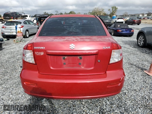 2012 Suzuki SX4 LE with VIN JS2YC5A39C6300577, listed as a Copart auction lot 86998944 with 103,354 mi miles and Non Repairable. Bid and sale history available at carsss.com. Image 6.