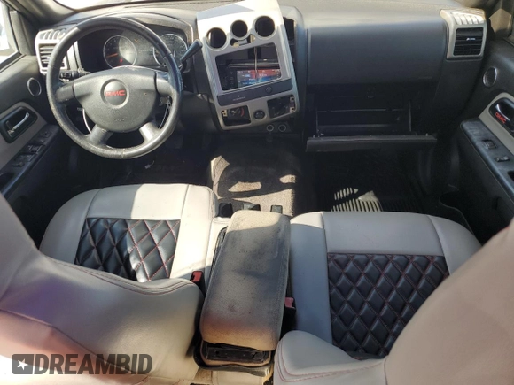 2012 GMC Canyon SLE1 with VIN 1GTD5MFE9C8108474, listed as a Copart auction lot 82650124 with 219,772 mi miles and Salvage Title. Bid and sale history available at carsss.com. Image 8.