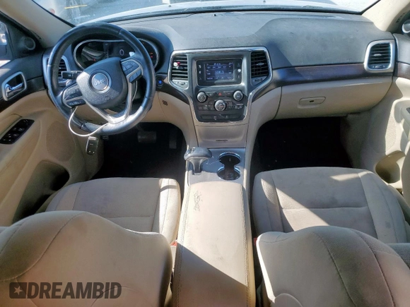 2014 Jeep Grand Cherokee Laredo with VIN 1C4RJEAG4EC182773, listed as a Copart auction lot 54085255 with 138,775 mi miles and Salvage Title. Bid and sale history available at DreamBid. Image 8.