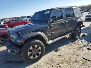 2019 Jeep Wrangler Unlimited Sahara with VIN 1C4HJXEG7KW637630, listed as a Copart auction lot 87192764 with 52,301 mi miles and Salvage Title. Bid and sale history available at carsss.com. Image 1.