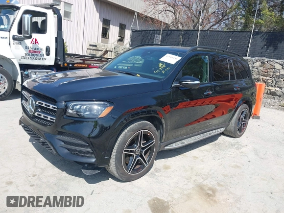 2023 Mercedes-Benz GLS 450 with VIN 4JGFF5KE8PA879956, listed as a IAAI auction lot 42116136 with 41,375 mi miles and . Bid and sale history available at DreamBid. Image 2.