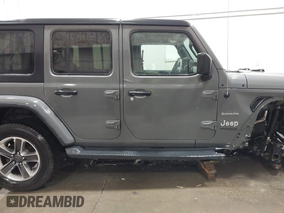 2019 Jeep Wrangler Unlimited Sahara with VIN 1C4HJXEG9KW656454, listed as a IAAI auction lot 41648236 with 75,403 mi miles and . Bid and sale history available at DreamBid. Image 14.