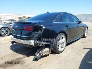 2016 Audi S6 Prestige z VIN WAUH2AFC6GN130251, wystawiony jako IAAI lot #41912382 z przebiegiem 72 512 mil mil oraz . Historia ofert i sprzedaży dostępna na DreamBid. Obrazek 4.