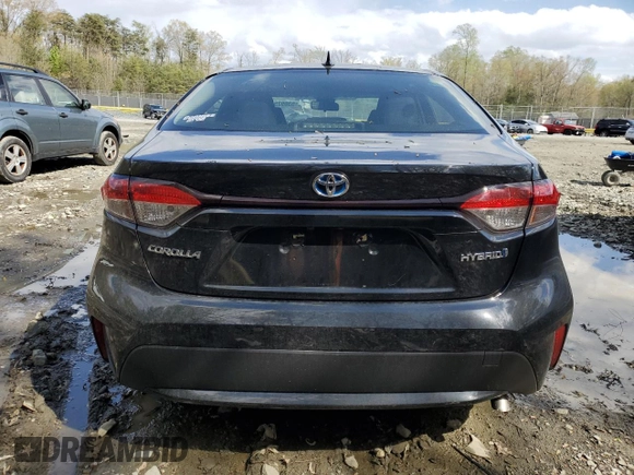 2021 Toyota Corolla Hybrid LE with VIN JTDEAMDE1MJ002887, listed as a Copart auction lot 53092595 with 65,547 mi miles and Salvage Title. Bid and sale history available at carsss.com. Image 6.