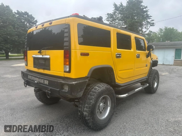 2003 Hummer H2 z VIN 5GRGN23U53H141743, wystawiony jako Copart lot #60153185 z przebiegiem 137 863 mil mil oraz Czysty tytuł • Clean title. Historia ofert i sprzedaży dostępna na DreamBid. Obrazek 4.