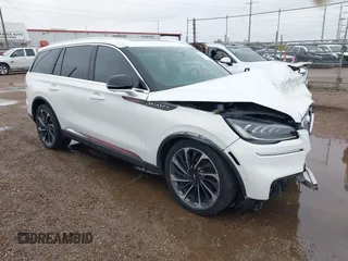 2021 Lincoln Aviator Reserve z VIN 5LM5J7WC6MGL12150, wystawiony jako IAAI lot #41337375 z przebiegiem 50 093 mil mil oraz . Historia ofert i sprzedaży dostępna na DreamBid. Obrazek 1.