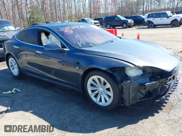 2017 Tesla Model S 100D with VIN 5YJSA1E22HF210635, listed as a IAAI auction lot 41854125 with 112,323 mi miles. Bid and sale history available at carsss.com. Image 1.