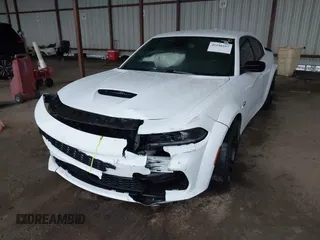 2023 Dodge Charger Scat Pack Widebody with VIN 2C3CDXGJ9PH516473, listed as a IAAI auction lot 41188167 with 38,021 mi miles and . Bid and sale history available at DreamBid. Image 17.