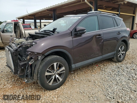 2016 Toyota RAV4 XLE with VIN 2T3RFREV9GW516247, listed as a Copart auction lot 56342505 with 105,718 mi miles and Salvage title. Bid and sale history available at DreamBid. Image 1.