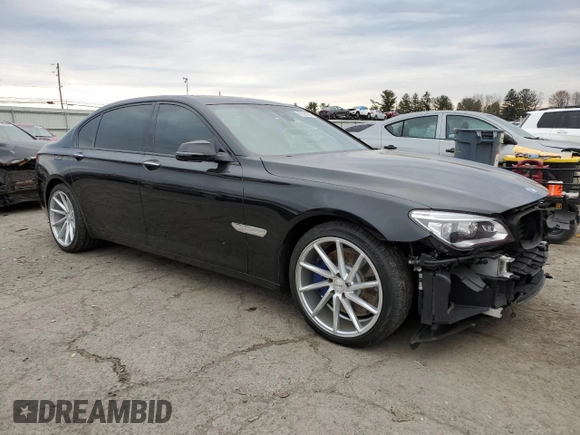 2015 BMW 7 Series 750Li xDrive z VIN WBAYF8C54FD654795, wystawiony jako Copart lot #82381894 z przebiegiem 56 968 mil mil oraz Szkoda całkowita • Salvage title. Historia ofert i sprzedaży dostępna na DreamBid. Obrazek 4.
