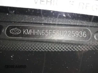 2006 Hyundai Tiburon GT z VIN KMHHN65F56U225936, wystawiony jako IAAI lot #41695280 z przebiegiem 121 110 mil mil oraz . Historia ofert i sprzedaży dostępna na DreamBid. Obrazek 17.