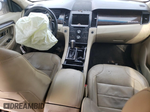 2016 Ford Taurus Limited with VIN 1FAHP2F8XGG124551, listed as a Copart auction lot 60621695 with 103,668 mi miles and Salvage title. Bid and sale history available at DreamBid. Image 8.