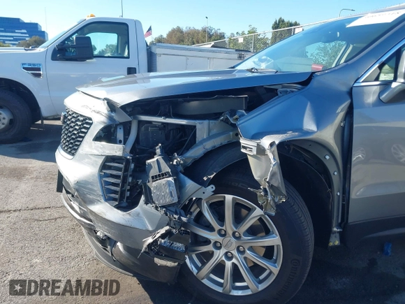 2023 Cadillac XT4 FWD Luxury with VIN 1GYAZAR43PF185264, listed as a IAAI auction lot 40659418 with 11,666 mi miles. Bid and sale history available at carsss.com. Image 6.