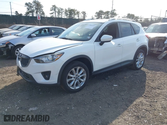 2014 Mazda CX-5 Grand Touring with VIN JM3KE4DY7E0425201, listed as a IAAI auction lot 41803597 with 118,867 mi miles. Bid and sale history available at carsss.com. Image 19.