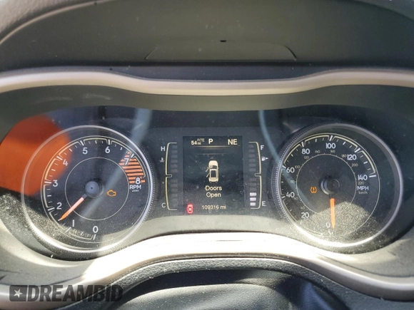 2017 Jeep Cherokee Altitude with VIN 1C4PJLAS6HW577086, listed as a Copart auction lot 57682925 with 109,316 mi miles and Salvage title. Bid and sale history available at DreamBid. Image 9.