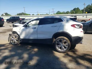 2022 BMW X2 xDrive28i z VIN WBXYJ1C02N5U27145, wystawiony jako Copart lot #56110705 z przebiegiem Nie podano mil oraz Szkody całkowita. Historia ofert i sprzedaży dostępna na DreamBid. Obrazek 2.
