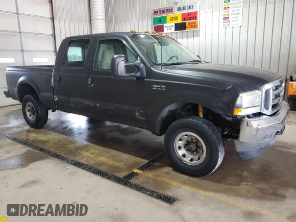 2002 Ford F-250 XL with VIN 1FTNW21L72EC87674, listed as a Copart auction lot 60322595 with Not provided miles and Salvage title. Bid and sale history available at DreamBid. Image 4.