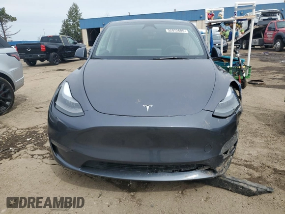 2023 Tesla Model Y Long Range z VIN 7SAYGDEE3PF884220, wystawiony jako Copart lot #52072605 z przebiegiem 44 996 mil mil oraz Czysty tytuł • Clean title. Historia ofert i sprzedaży dostępna na DreamBid. Obrazek 5.