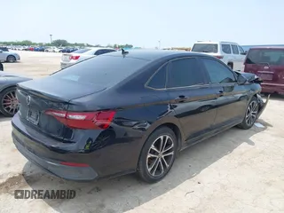 2024 Volkswagen Jetta Sport with VIN 3VWAM7BU3RM018730, listed as a IAAI auction lot 42158484 with 19,482 mi miles and . Bid and sale history available at DreamBid. Image 4.