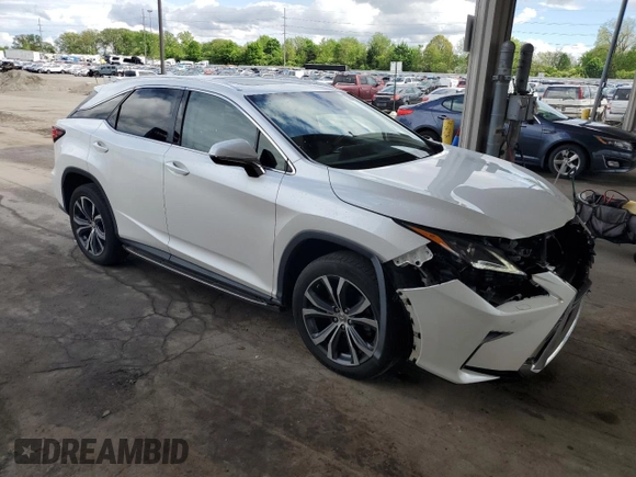 2016 Lexus RX 350 with VIN JTJBZMCA8G2003217, listed as a Copart auction lot 56563635 with 113,581 mi miles and Salvage title. Bid and sale history available at DreamBid. Image 4.