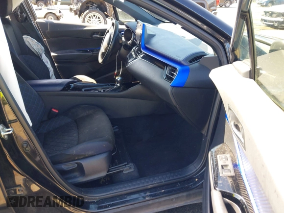 2020 Toyota C-HR LE with VIN JTNKHMBX9L1063563, listed as a IAAI auction lot 41986457 with 143,694 mi miles. Bid and sale history available at carsss.com. Image 5.
