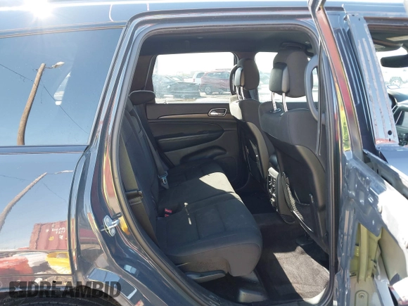 2018 Jeep Grand Cherokee Laredo E with VIN 1C4RJFAG4JC370502, listed as a IAAI auction lot 41342367 with 104,307 mi miles. Bid and sale history available at carsss.com. Image 8.