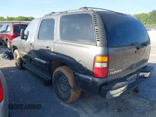 2001 GMC Yukon SLT with VIN 1GKEK13T81J177892, listed as a IAAI auction lot 41924669 with 198,561 mi miles. Bid and sale history available at carsss.com. Image 3.