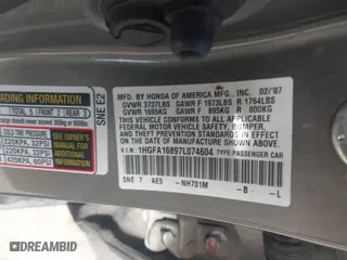 2007 Honda Civic Sdn EX with VIN 1HGFA16897L074604, listed as a IAAI auction lot 41695508 with 148,325 mi miles. Bid and sale history available at carsss.com. Image 9.
