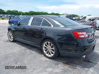 2013 Ford Taurus Limited with VIN 1FAHP2F84DG220283, listed as a IAAI auction lot 40045974 with 155,409 mi miles and . Bid and sale history available at DreamBid. Image 3.