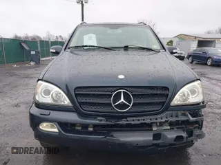2003 Mercedes-Benz M-Class 3.2L with VIN 4JGAB54EX3A390987, listed as a IAAI auction lot 41482335 with 191,381 mi miles. Bid and sale history available at carsss.com. Image 12.