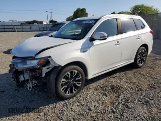 2018 Mitsubishi Outlander SEL with VIN JA4J24A56JZ071856, listed as a Copart auction lot 57719975 with 140,881 mi miles and Salvage title. Bid and sale history available at DreamBid. Image 1.