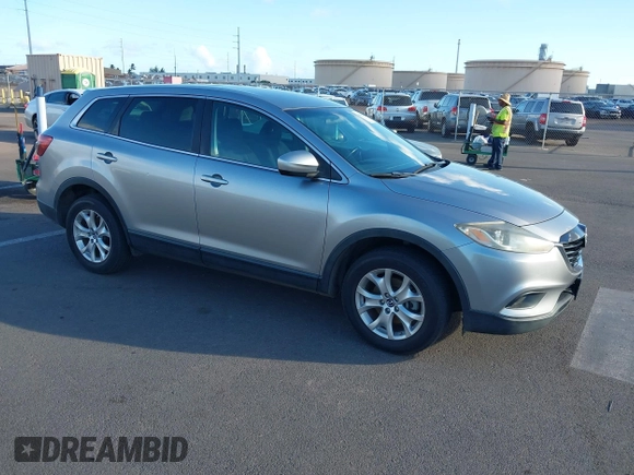 2015 Mazda CX-9 Sport with VIN JM3TB2BA3F0464294, listed as a IAAI auction lot 40848645 with 116,778 mi miles and . Bid and sale history available at carsss.com. Image 1.